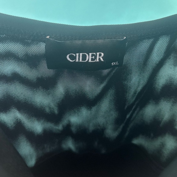 Cider Black Romper with high slits on each side. - Picture 2 of 3